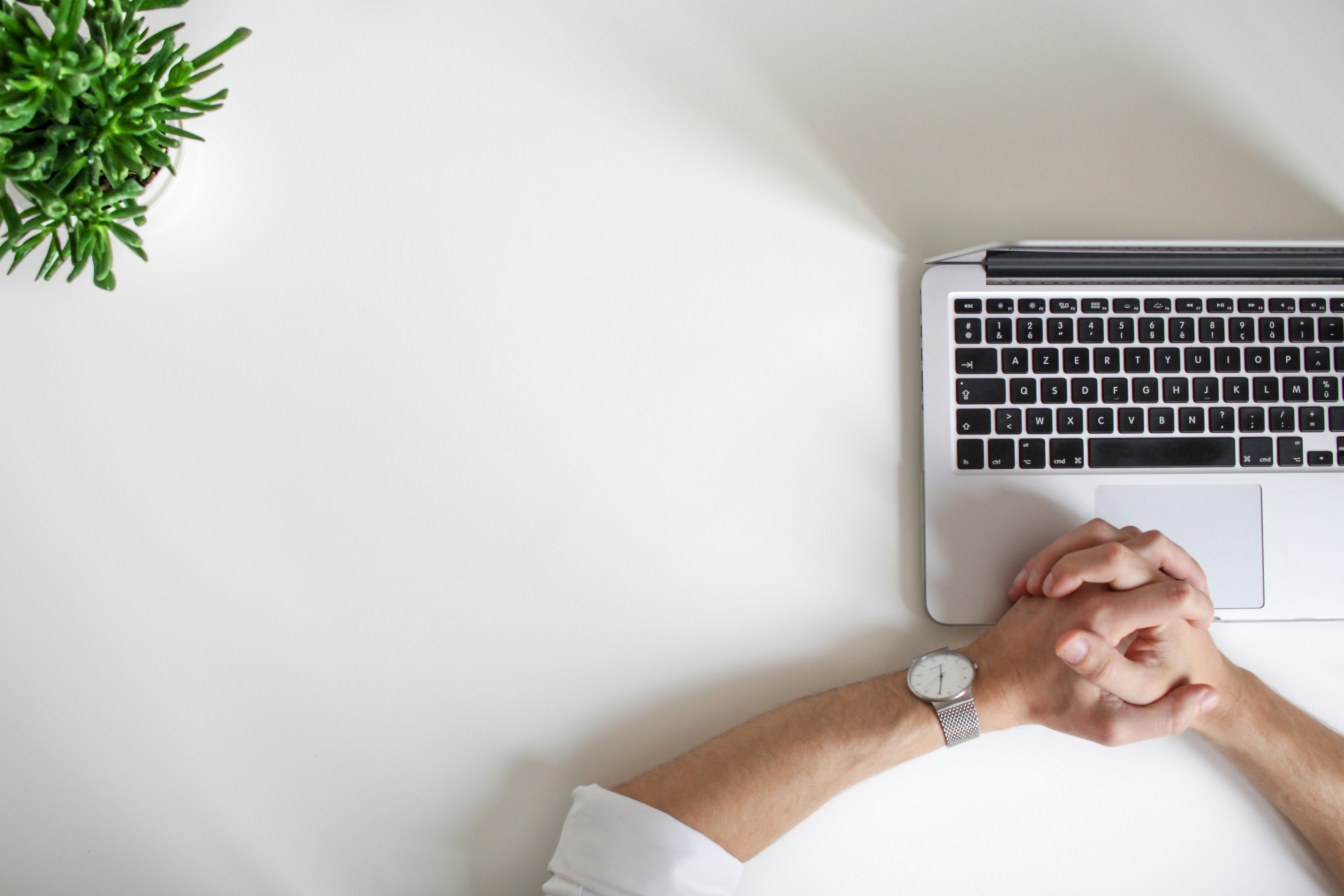 Professional working efficiently at a modern office desk